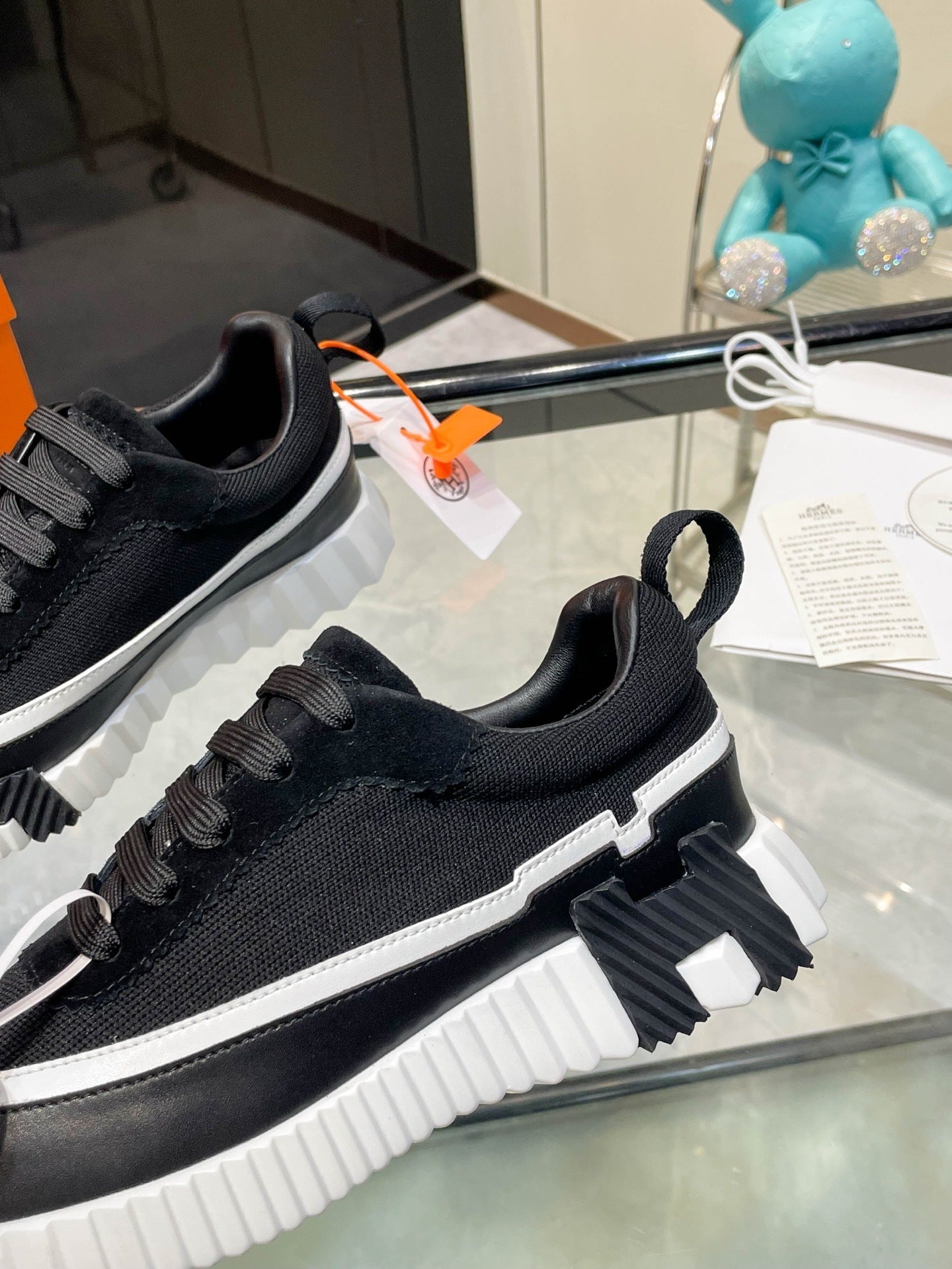 Zapatillas de cuero a rayas H