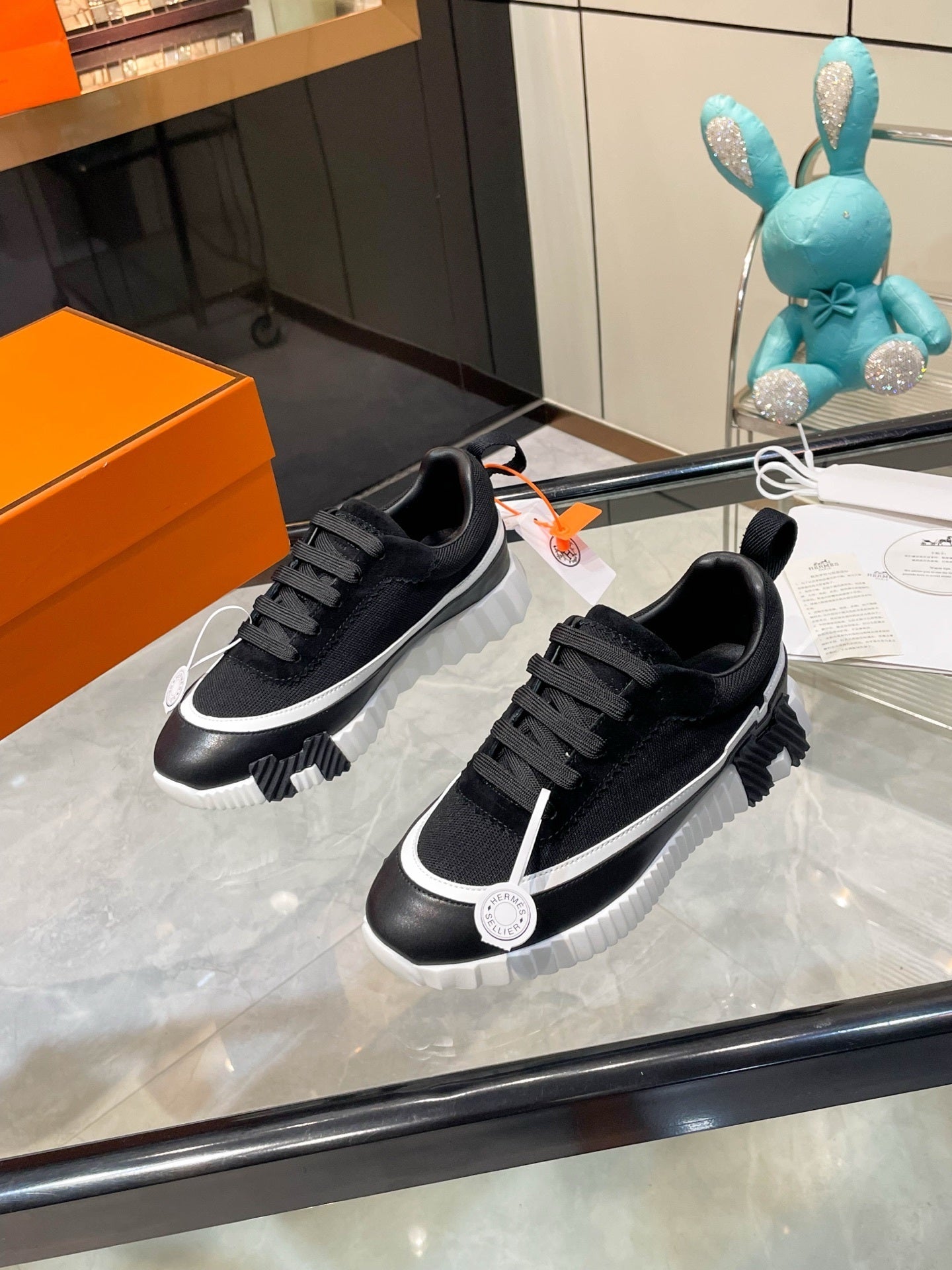 Zapatillas de cuero a rayas H